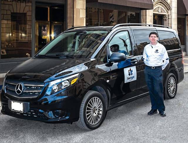 See Sight Tour Guide with Black Van.jpg