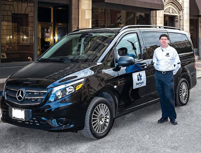 See Sight Tour Guide with Black Van.jpg