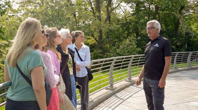 See Sight Tours guide with tourist.jpg