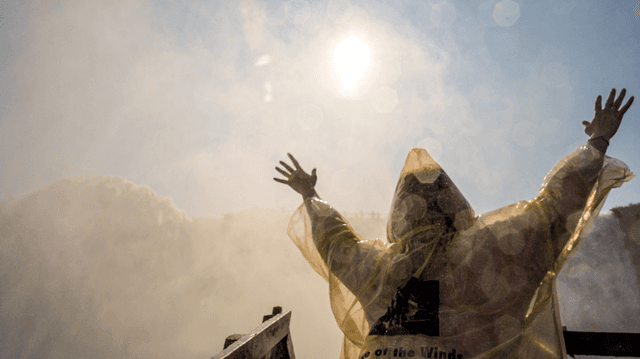 A person in yellow poncho.jpg