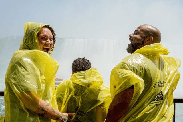 Visitors in yellow ponchos enjoyingNiagara Falls, Canada Tour from Toronto.jpg