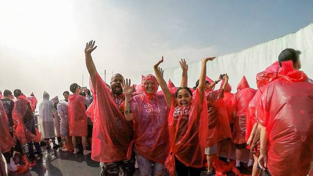 People enjoying Niagara Falls Hornblower Cruise tour.