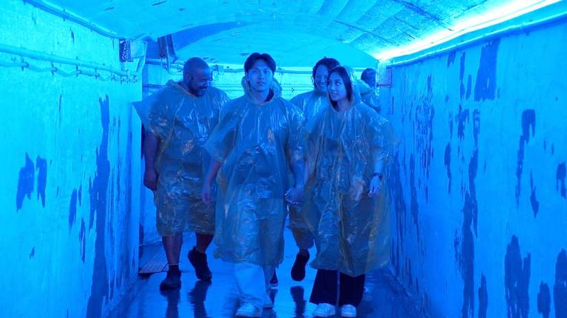 People in Journey Behind Falls tunnel tour.jpg