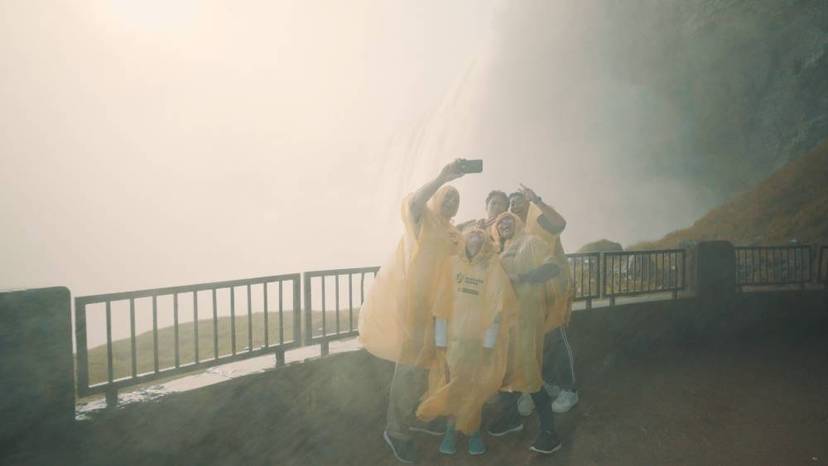 Visitors taking a selfie from Journey Behind the Falls.