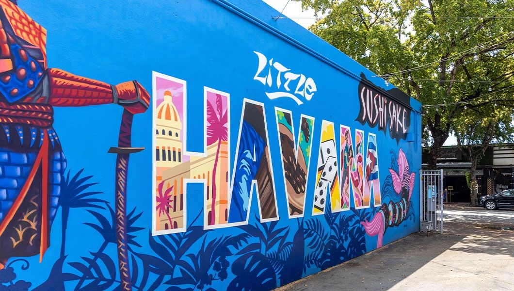 https://res.cloudinary.com/see-sight-tours/image/upload/v1744950625/strapi/Sushi_sake_with_colorful_decorated_facade_in_Little_Havana_in_Miami_f2d1eed6d1.jpg