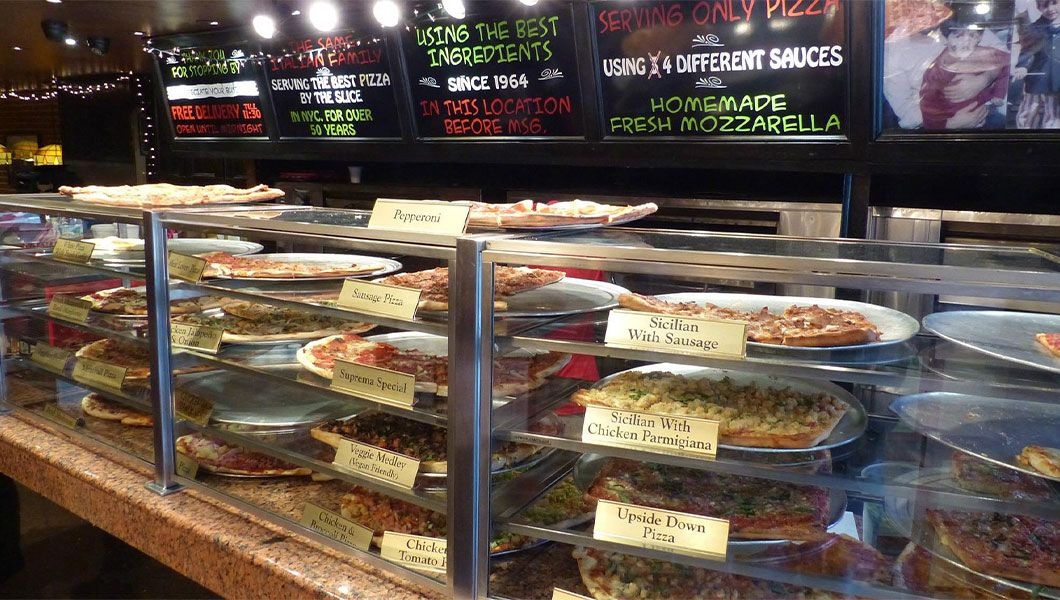 https://res.cloudinary.com/see-sight-tours/image/upload/v1745238385/strapi/NY_Pizza_Suprema_New_York_627ec42d13.jpg