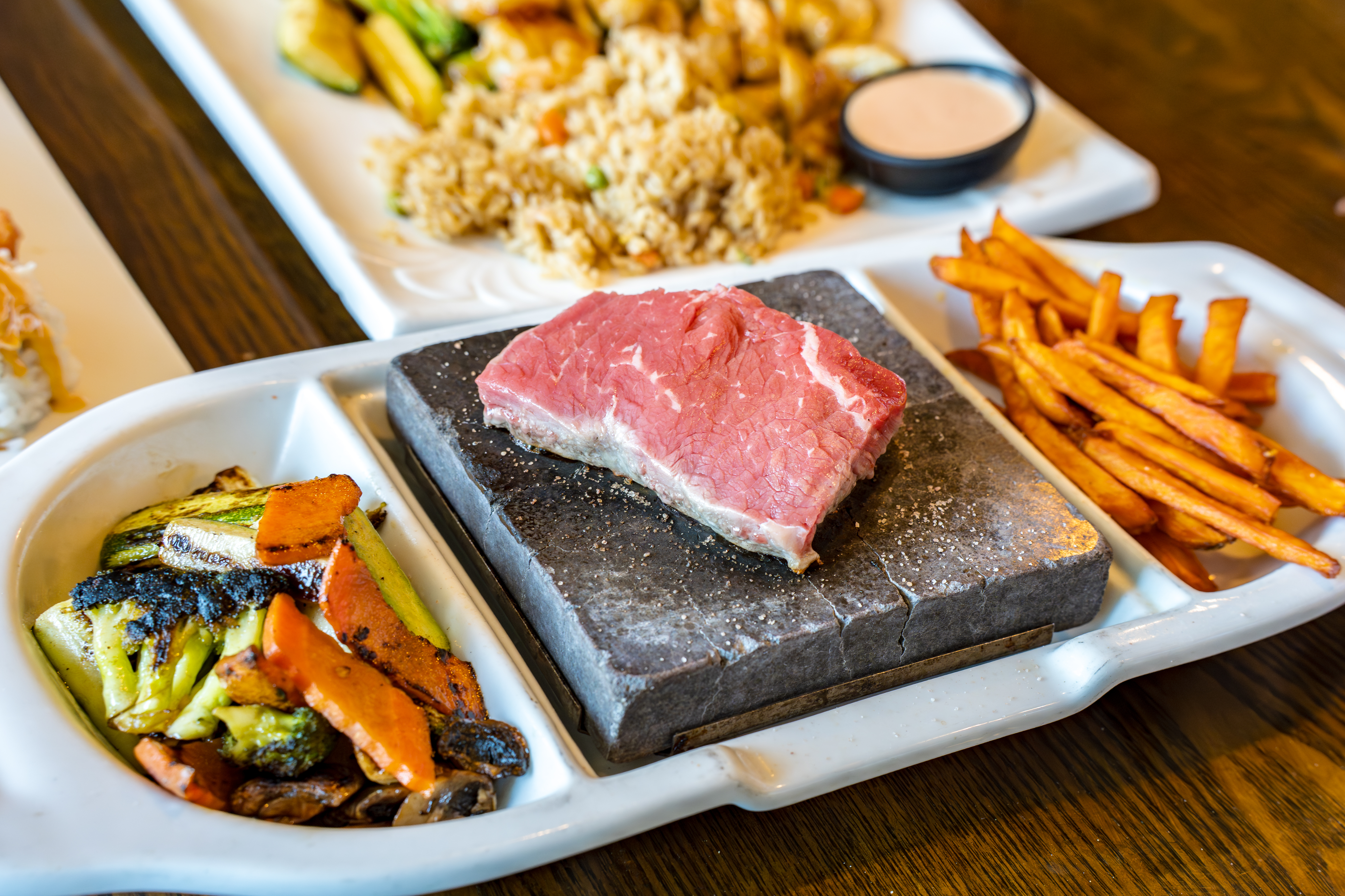 https://res.cloudinary.com/see-sight-tours/image/upload/v1787333582/strapi/Steak_Stone_Sushi_Restaurant_5acf9da229.jpg